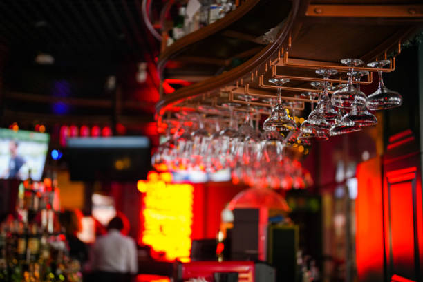 istock glasses lined up at the bar. bar background 1499519070