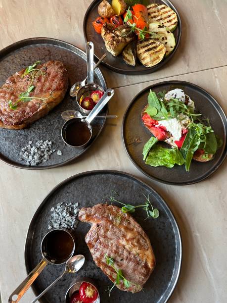 istock Ribeye steak and veggies 1499520540