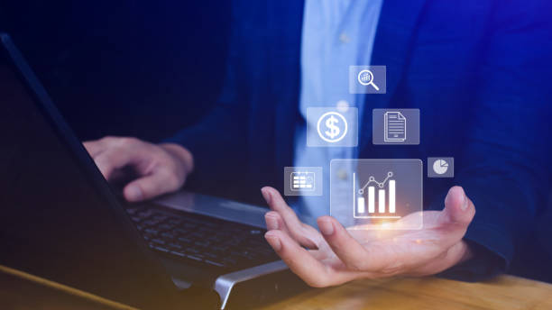 istock Big data analytics and business intelligence BI concept with chart and graph icons on digital screen interface and business people in the background. 1499520642