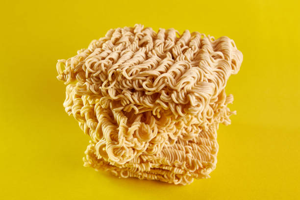 istock Instant vermicelli on a yellow background. Instant food. 1499520716