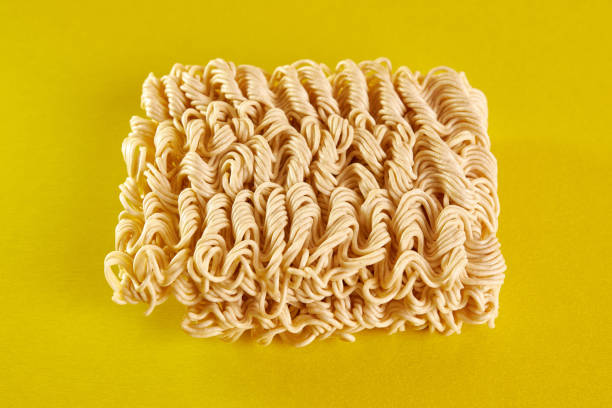 istock Instant vermicelli on a yellow background. Instant food. 1499522152