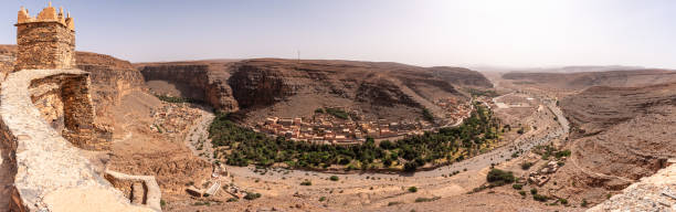Hiking through the old Id Aissa agadir, an old granary in Amtoudi Hiking through the old Id Aissa agadir, an old granary in Amtoudi, Morocco sunset agadir marocco stock pictures, royalty-free photos & images