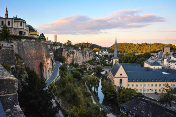 Colorful Sunset at the Grund - Luxembourg City Luxembourg is a landlocked country in Western Europe. It borders Belgium to the west and north, Germany to the east, and France to the south. luxemburg stock pictures, royalty-free photos & images