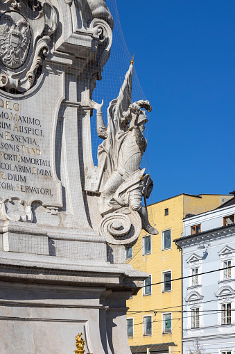 Linz, Austria - March 4, 2023: Baroque Holy Trinity Column on the main square (Hauptplatz). It is plague pillar built in 18th century