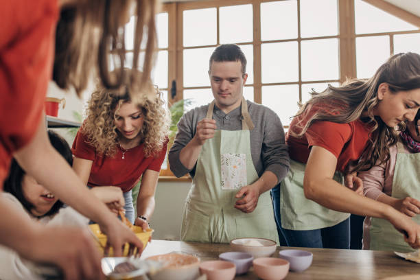 istock People with down syndrome on cooking class 1499565486