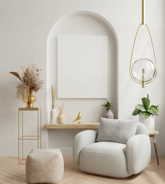 istock Poster mockup with vertical frame on empty white wall in living room interior with blue velvet armchair. 1499570473