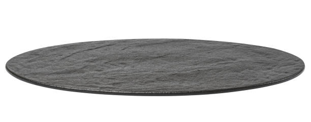 istock Empty black oval board for serving food on a white isolated background 1499572347