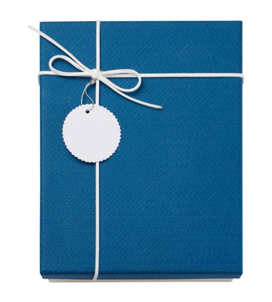 istock Blue cardboard gift box with a lid and a tag on a white isolated background, top view 1499573038