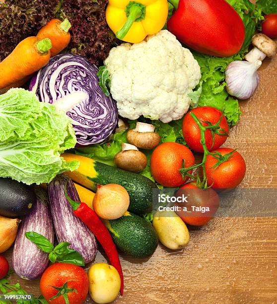 Assortment Of Fresh Organic Vegetables On The Wooden Desk Stock Photo - Download Image Now