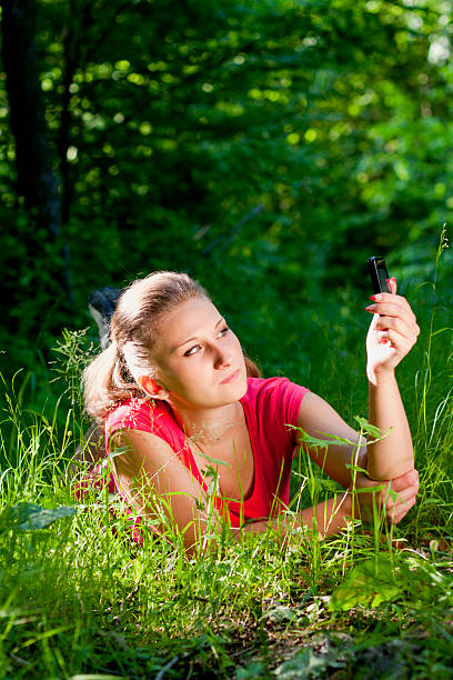 istock Girl with phone 149957526