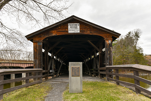 Perrine's Bridge is the second oldest covered bridge in the State of New York. This Burr Arch Truss Bridge crosses the Wallkill River in the Town of Esopus-Rosendale near Rifton, NY.