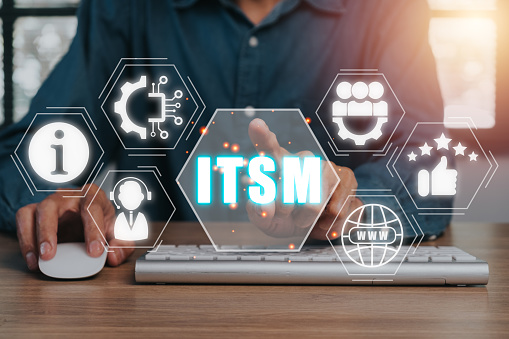 ITSM, information technology service management concept, Business person hand touching information technology service management icon on virtual .