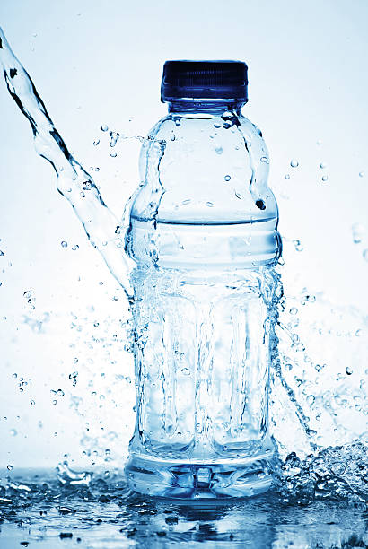 istock Water splash out of glass 149958139