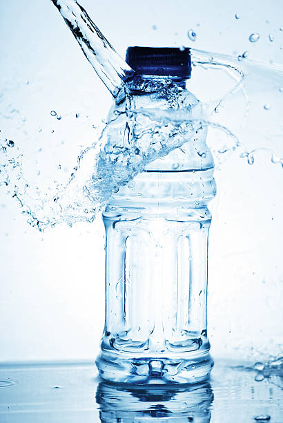 istock Water splash out of glass 149958141
