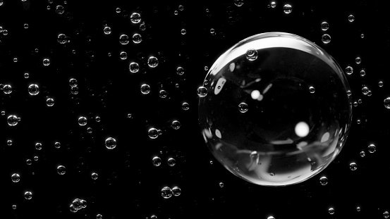 Round bubbles floating in an infinite space