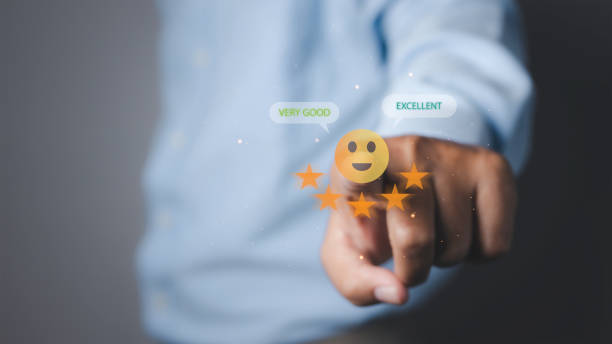 istock Man touching on five star icon and happy smiley face for satisfaction service. 1499617800