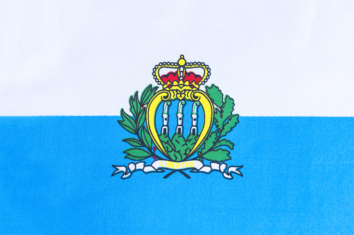 the national flag of San Marino on a fabric basis close-up