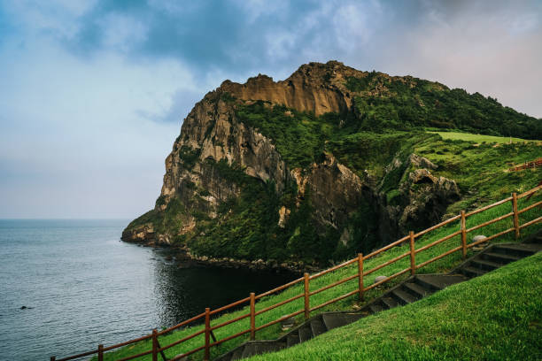 Seongsan Ilchulbong moutain in Jeju Island, South Korea. Seongsan Ilchulbong moutain in Jeju Island, South Korea. jeju city stock pictures, royalty-free photos & images