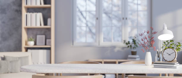 istock Copy space on a white tabletop with decor in a modern cozy living room. 1499623610