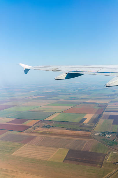 istock View from the airplane window during taking off on a clear summer morning 1499638294