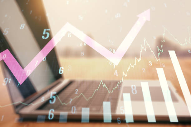 istock Multi exposure of abstract creative financial graph with upward arrow on modern laptop background, forex and investment concept 1499639423
