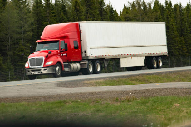 istock transport semi  truck carrying cargo 1499642948