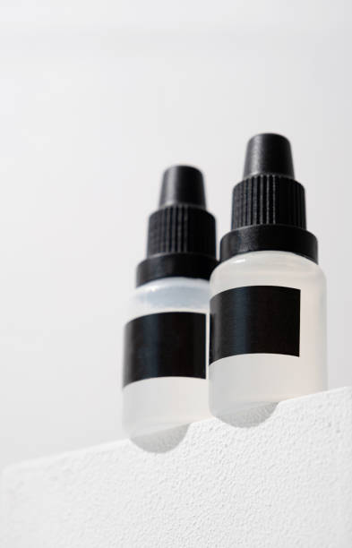 istock Set of plastic dropper bottles with liquid with black blank stickers. Mockup 1499642961