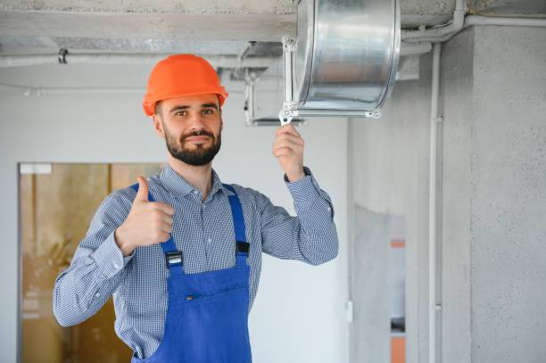 istock hvac engineer install heat recovery ventilation system for new house. copy space 1499647122