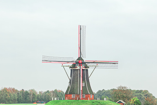 Traditional wind mill on the countryside