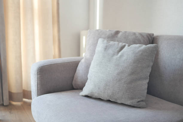 istock modern grey sofa with pillows in living room at home 1499648813