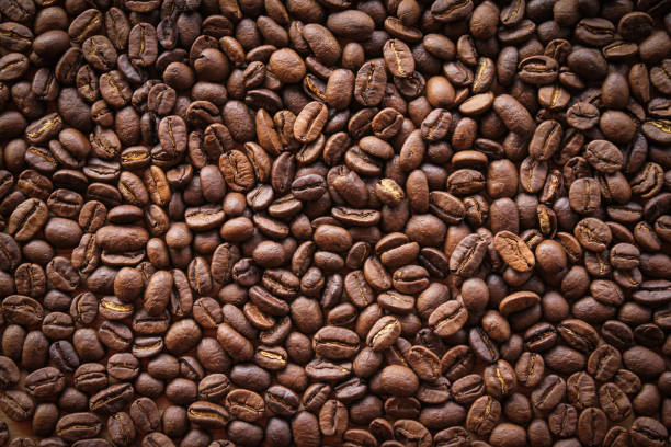 istock Close up of roasted coffee beans background 1499651041