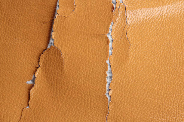 istock Old crack orange or brown leather sheet texture 1499651053