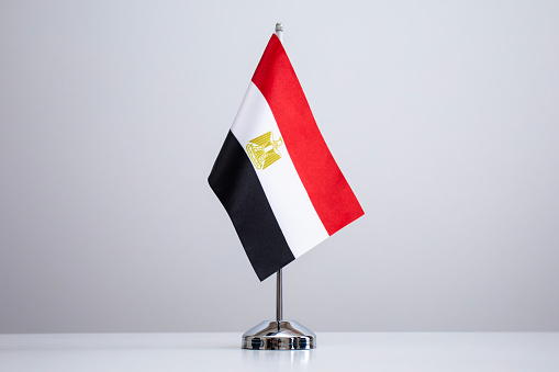 Small national flag of the Egypt on a white background. High quality photo
