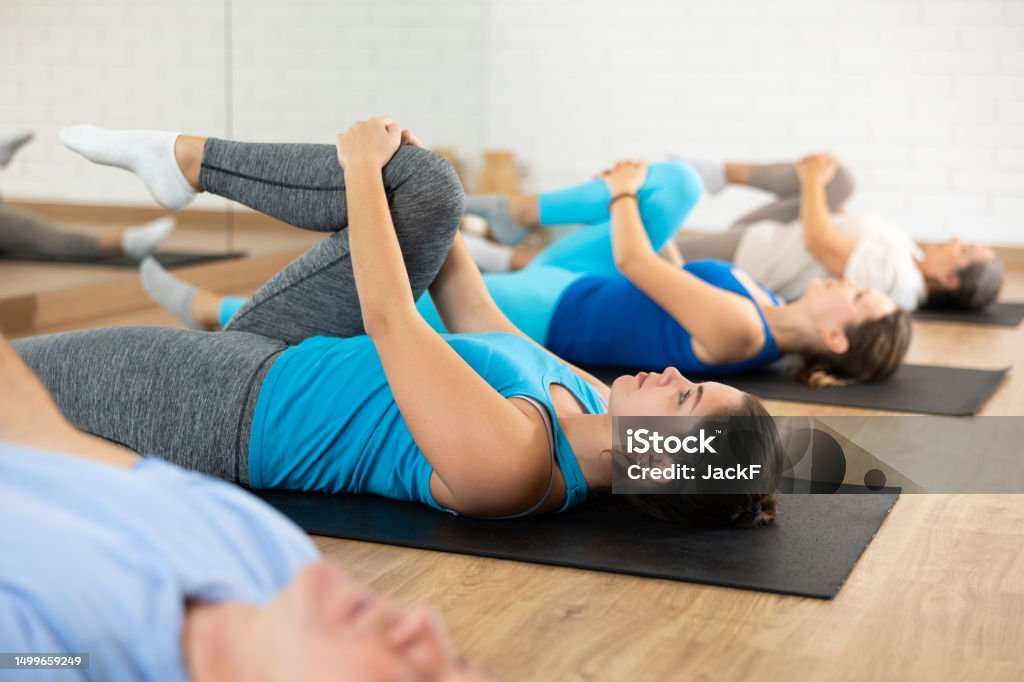 Girl Hamstrings Girl Doing Hamstrings Stretching Exercises During Group Training Stock ...