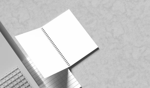istock Spiral binder notebook mock up isolated on light gray background. 3D illustration 1499659310