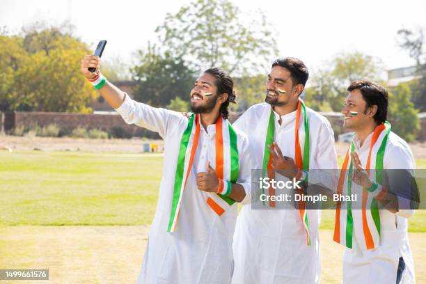 Group Portrait Of Young Indian Men Wearing Traditional White Kurta And Group Portrait Of Young Indian Men Wearing Traditional White Kurta And