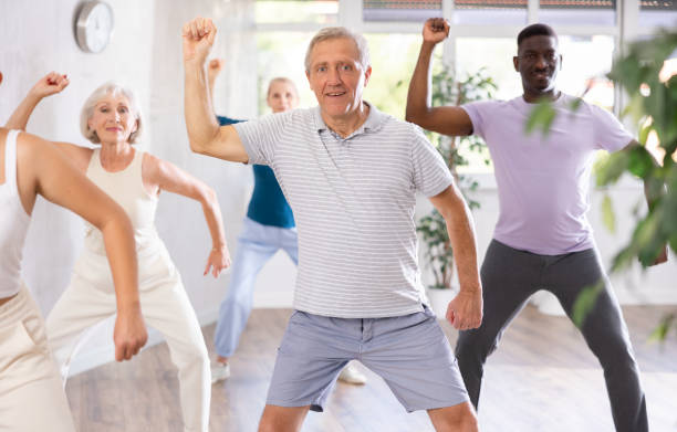 istock Group of multiethnic mature people dancing modern dance 1499661662