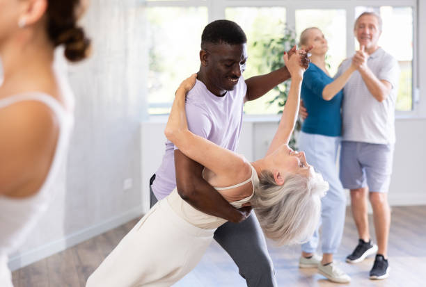 istock Group of multiethnic mature people dancing social dance 1499661716