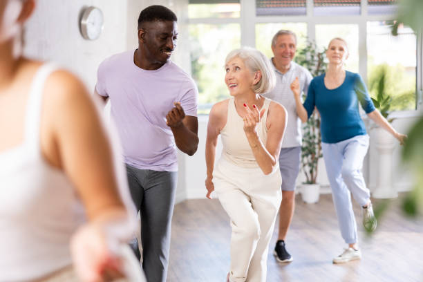 istock Group of multiethnic mature people dancing social dance 1499661732
