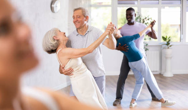 istock Group of multiethnic mature people dancing social dance 1499661733