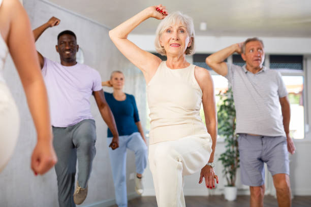 istock Senior woman learning to dance krump in modern choreographic studio 1499662089