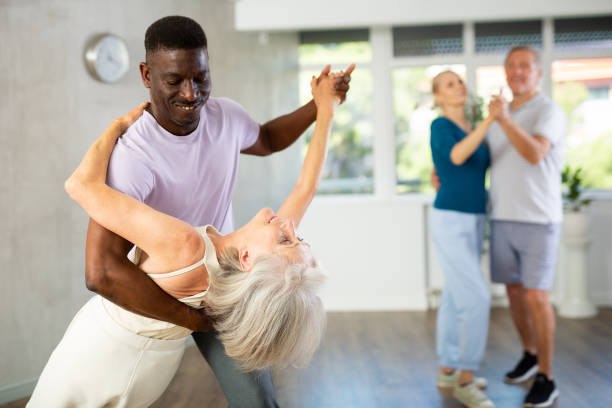 istock Group of multiethnic mature people dancing social dance 1499662495