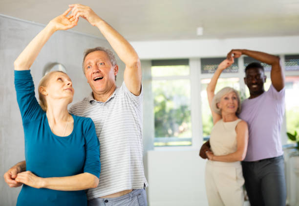 istock Group of multiethnic mature people dancing social dance 1499662521