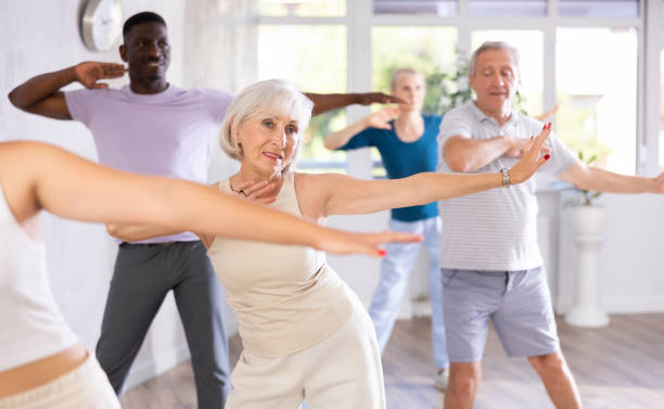 istock Senior woman dancing hip hop in studio practicing dance number. 1499662532
