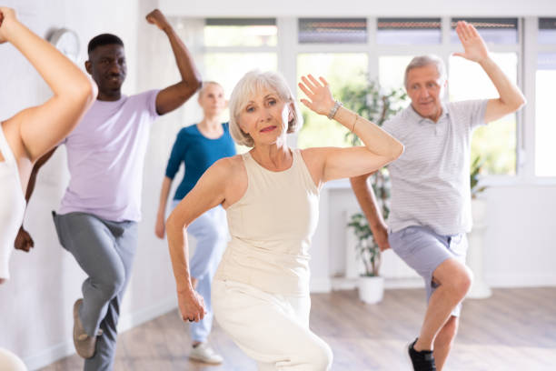 istock Group of multiethnic mature people dancing hip hop 1499662544
