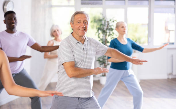 istock Group of multiethnic mature people dancing modern dance 1499662693