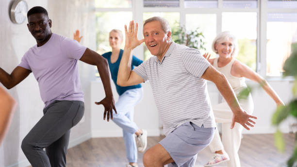 istock Group of multiethnic mature people dancing hip hop 1499662748