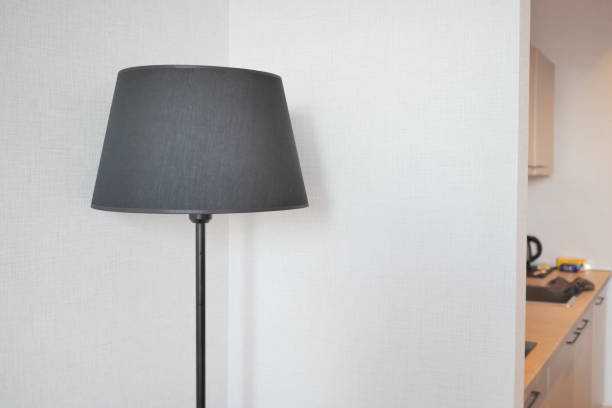 istock a lamp in home against white wall 1499662912