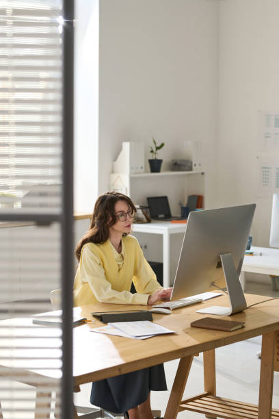 istock Businesswoman working on computer in office 1499663396