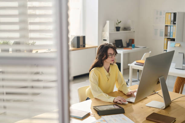istock Businesswoman working on computer at her workplace 1499663398